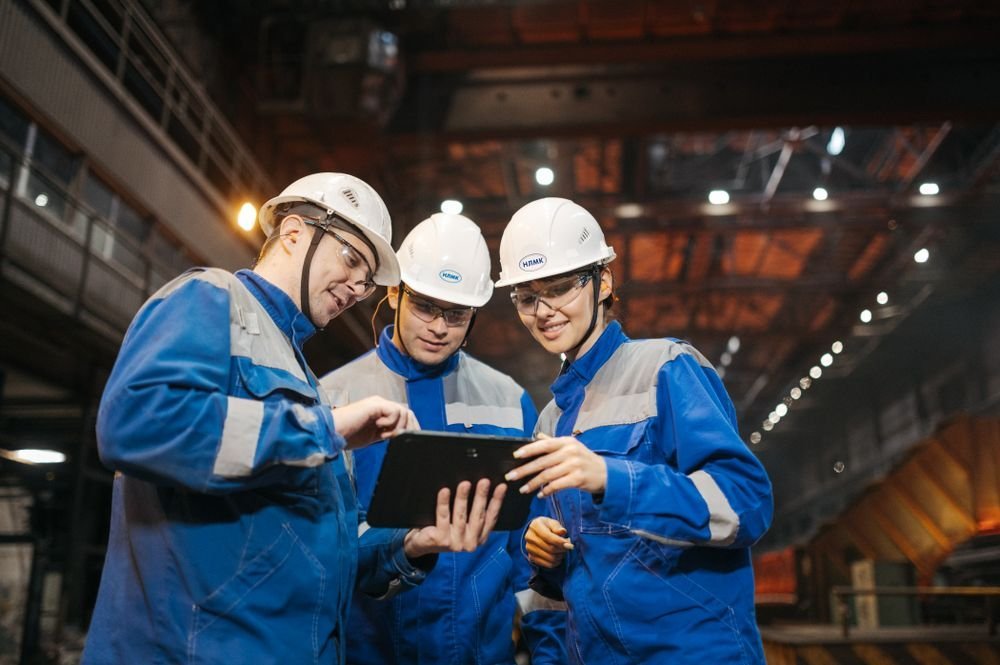 Industrial engineers working in a factory setting