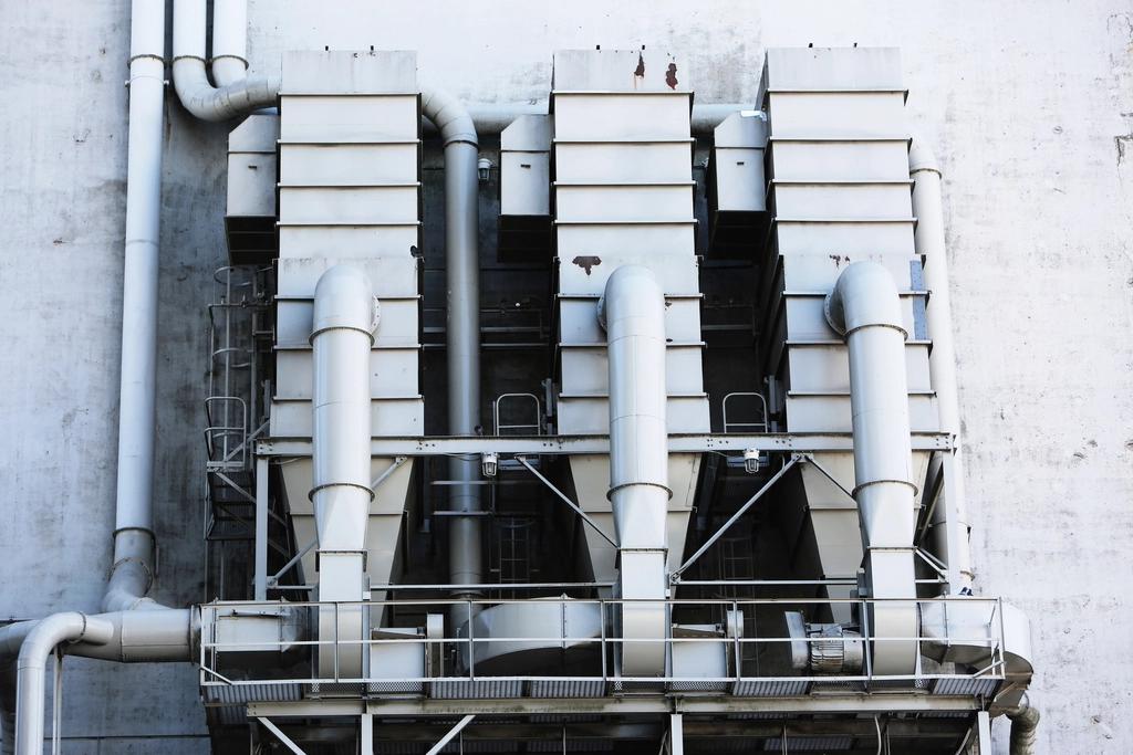 Airflow velocity testing with an anemometer in a controlled area