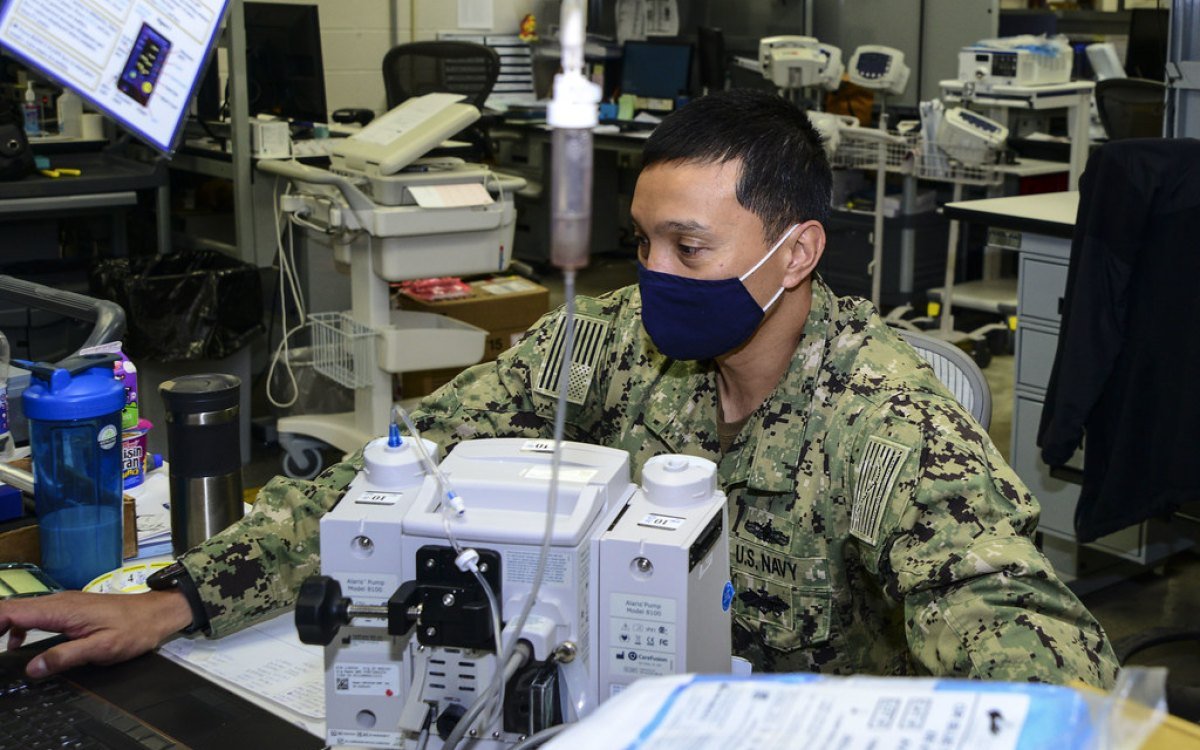 EEG machine calibration with a calibrated signal simulator